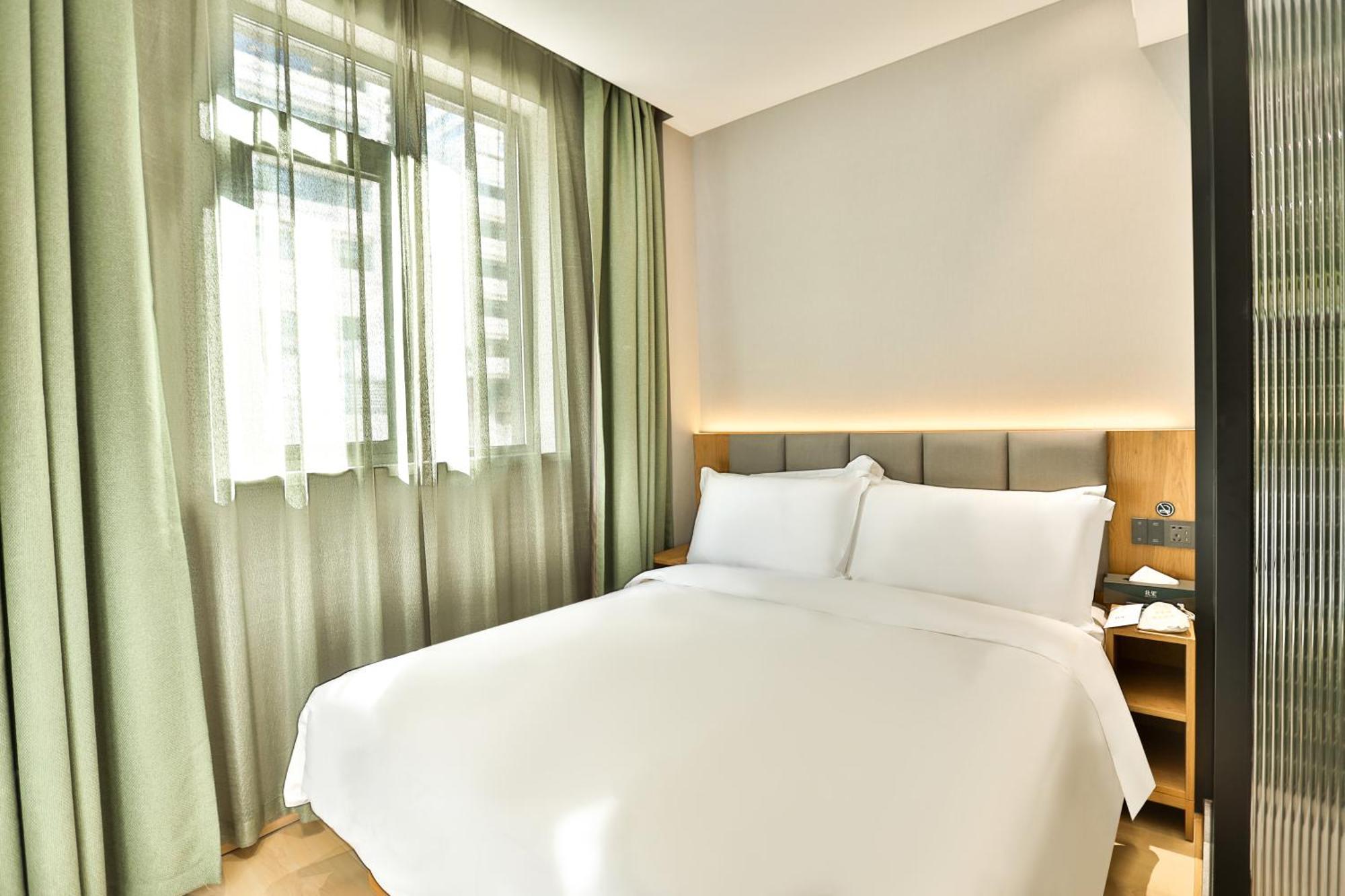 True Go Hotel - Shanghai Jing'An Temple Nanjing West Road Екстер'єр фото
